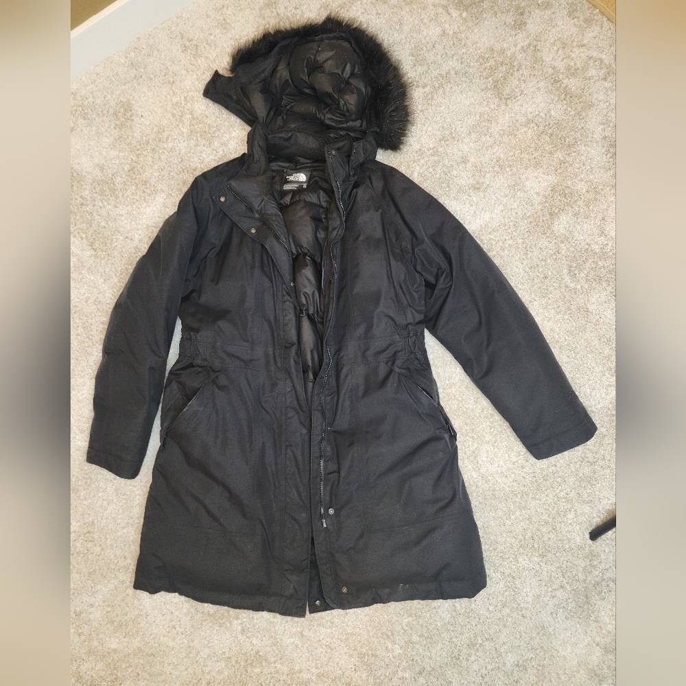 Womens North face long black jacket with fur color